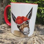 TA1000 Tasse Schwarzwald Esel roter Rand roter Henkel