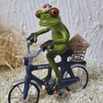 GLF2005 Gl&uuml;cksfrosch Pizza-Pote mit blauem Fahrrad und Pizzaschachtel