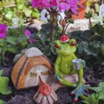 GLF2007 Gl&uuml;cksfrosch Urlauber mit Zelt und Lagerfeuer