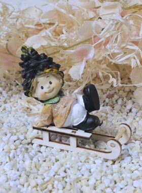 Schwarzwaldwichtele Villingen auf Schlitten