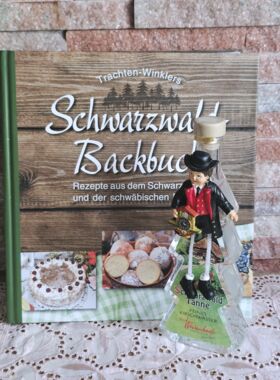 Schwarzw&auml;lder Backbuch mit Kirschwasserwasser B&auml;umle Magnet Schwarzwaldbub